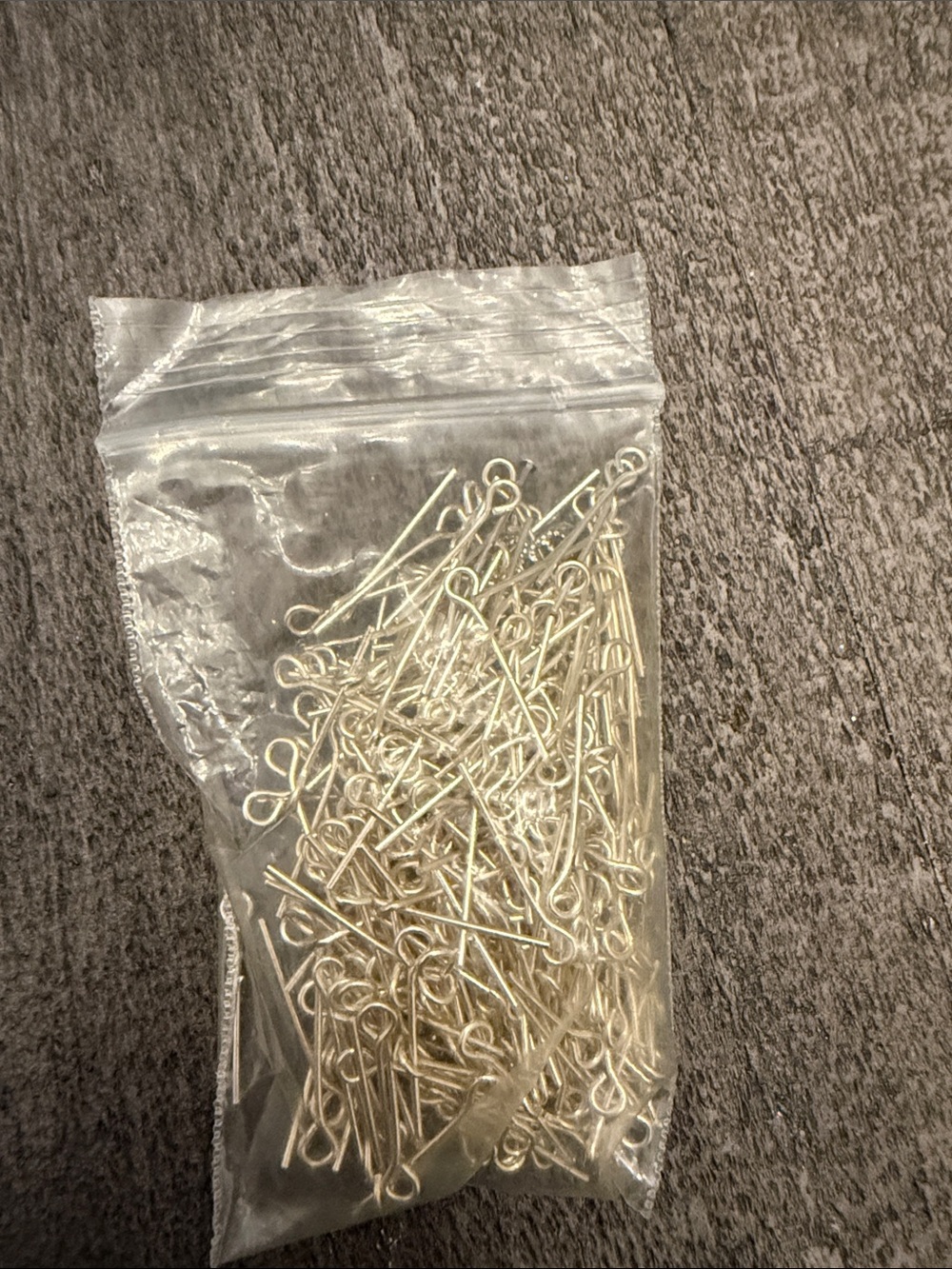 Bag of Silver-Colored Eye Pins